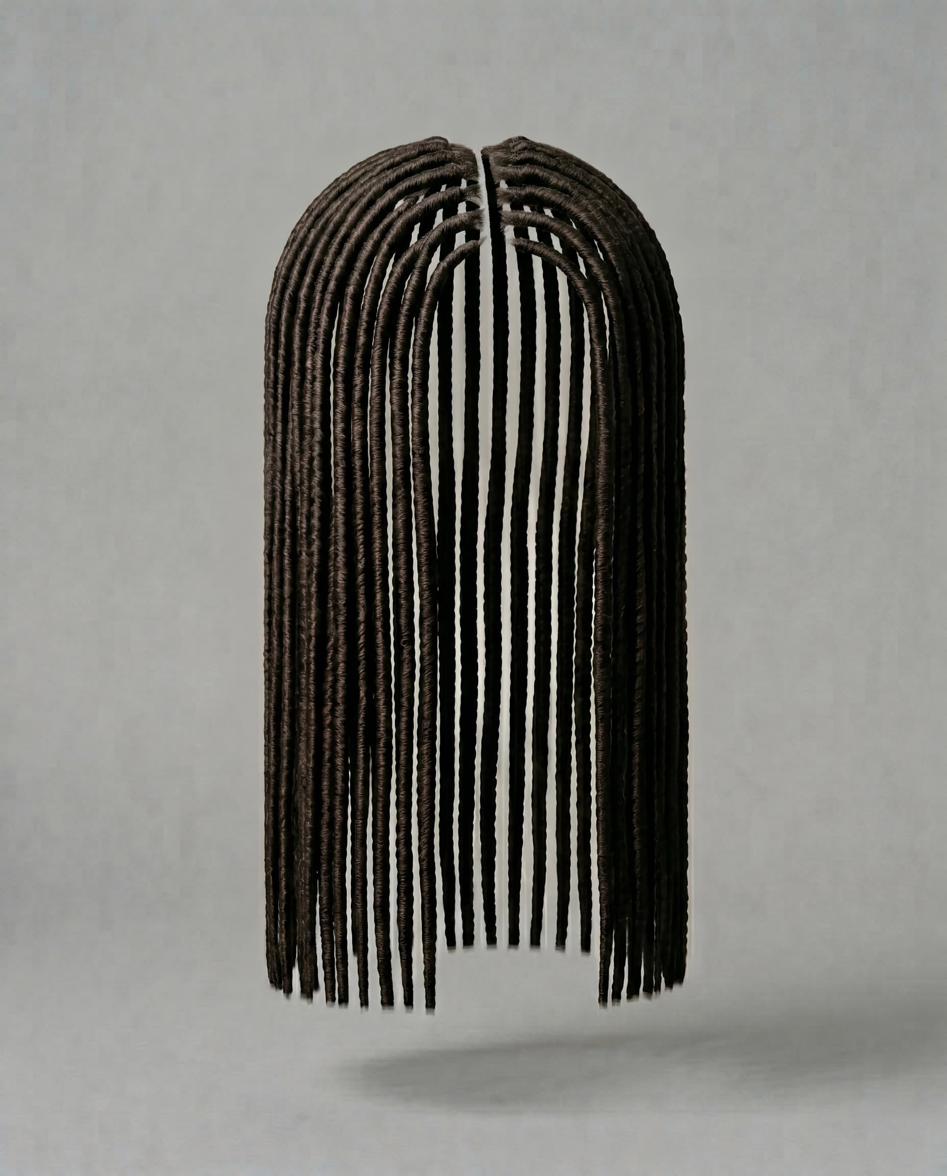 Faux locs, temporary locs wrapped over braided hair and hanging long